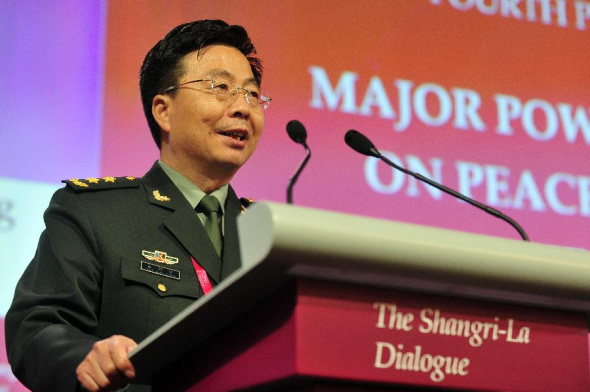 Wang Guanzhong, deputy chief of the General Staff of the Chinese People's Liberation Army, speaks during the fourth plenary session of the 13th Shangri-La Dialogue in Singapore June 1, 2014, the final day of the multilateral forum focusing on security issues in Asia. (Xinhua/Then Chih Wey)