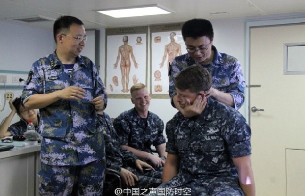 The Peace Ark hospital ship of the Navy of the Chinese Peoples Liberation Army (PLAN) participating in the Rim of the Pacific 2014 (RIMPAC) multinational naval exercises hosted a training course on traditional Chinese medicine (TCM) on the afternoon of July 8, 2014