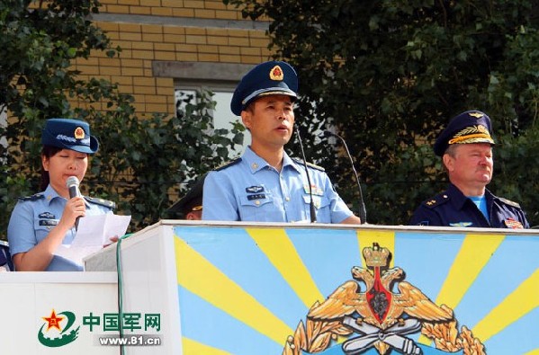 Yu Hejie, commander of the aviation element of the Air Force of the Chinese Peoples Liberation Army (PLAAF), is giving a speech at the opening ceremony of the Aviadarts 2014 International Pilot Competition on July 22, 2014. (Chinamil.com.cn/Yang Zhen)