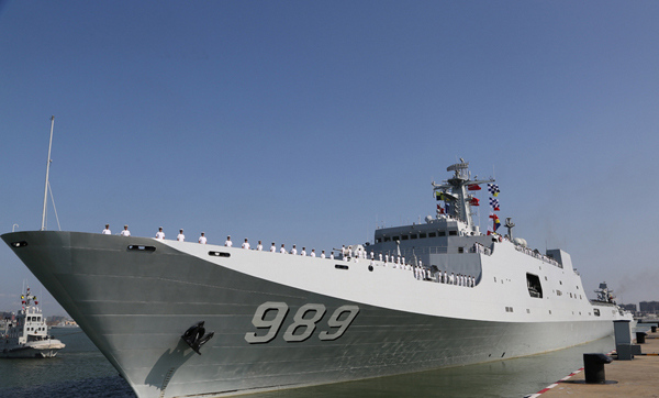 The picture shows the Chinese amphibious dock landing ship “Changbaishan” is setting sail. The 18th naval escort taskforce under the Navy of the Chinese People’s Liberation Army (PLAN) sets sail from Zhanjiang to the Gulf of Aden at 09:00, August 1, 2014. (Chinamil.com.cn/Zeng Xingjian)