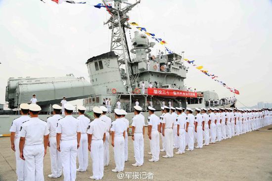 Seen in the picture is the site of the decommissioning ceremony of the guided missile destroyer Chongqing warship. The Chinese People's Liberation Army Navy (PLAN) held a decommissioning ceremony for the guided missile destroyer Chongqing (hull number: 133) at a naval port of the East China Sea Fleet on September 26, 2014. (Chinamil.com.cn/Liang Jie)