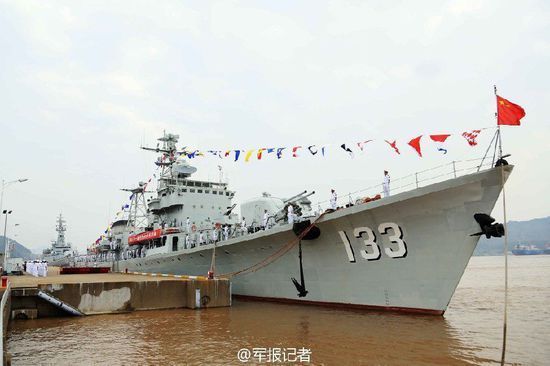 Seen in the picture is the site of the decommissioning ceremony of the guided missile destroyer Chongqing warship. The PLAN held a decommissioning ceremony for the guided missile destroyer Chongqing (hull number: 133) at a naval port of the East China Sea Fleet on September 26, 2014. (Chinamil.com.cn/Liang Jie)