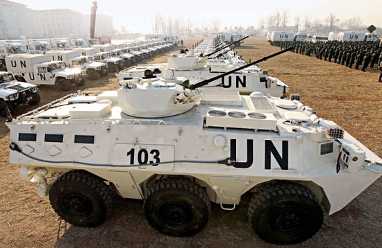 The 92B Wheel-Type IFV of the Chinese peacekeeping infantry battalion: A 6x6 armored amphibious fighting vehicle, it is 7.1 meters long, 2.9 meters high, weighs 17 tonnes, and reaches up to 85 km/h on road and 9 km/h in water. 