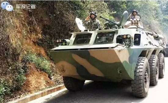 This photo released by the official WeChat account of PLA Daily shows an infantry fighting vehicle being deployed to take part in a live-ammunition drill which will start Tuesday in a border area of Yunnan province near Myanmar.  