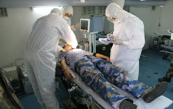 A nuclear emergency medical rescue drill codenamed Medical Service Force �C 2015C is conducted at a training base of the PLA Academy of Military Medical Sciences (AMMS) in July 2015.