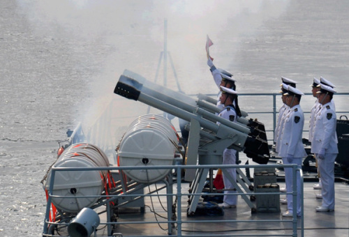 The Chinese fleet arrives at the Russian port of Vladivostok on Thursday to take part in a nine-day naval drill with Russian counterparts. (China Daily/Hu Shanmin)