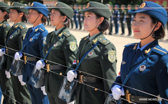 Soldiers take part in a training for a military parade in Beijing, capital of China, Aug. 4, 2015. China will hold a grand military parade on Sept. 3 to mark the 70th anniversary of the victory of the Chinese People's War of Resistance Against Japanese Aggressions and the World Anti-Fascist War. (Photo: Xinhua/Tian Feng) 