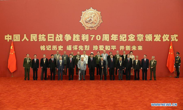 A medal awarding ceremony is held at the Great Hall of the People in Beijing, capital of China, Sept. 2, 2015. Chinese President Xi Jinping on Wednesday granted medals to 30 Chinese and foreign veterans and civilians who fought for China in the World War II. (Photo: Xinhua/Pang Xinglei)