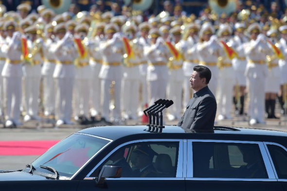 Chinese President Xi Jinping inspects troops of the Chinese People's Liberation Army during the commemoration activities to mark the 70th anniversary of the victory of the Chinese People's War of Resistance Against Japanese Aggression and the World Anti-Fascist War, in Beijing, capital of China, Sept. 3, 2015. (Photo: Xinhua/Luo Xiaoguang)