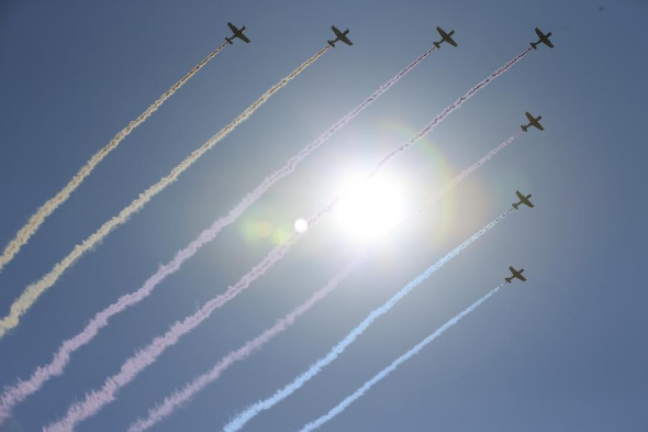 Trainer aircraft escorting the flags attend a parade in Beijing, capital of China, Sept. 3, 2015. China on Thursday held commemoration activities, including a grand military parade, to mark the 70th anniversary of the victory of the Chinese People's War of Resistance Against Japanese Aggression and the World Anti-Fascist War. (Photo: Xinhua/Ren Zhenglai)