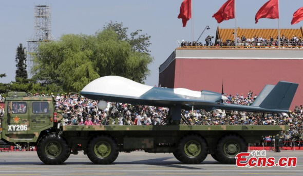 A military vehicle carrying an unmanned aerial vehicle drives past the Tian'anmen Square during the military parade marking the 70th anniversary of the end of World War II, in Beijing, September 3, 2015. (Photo/ECNS)