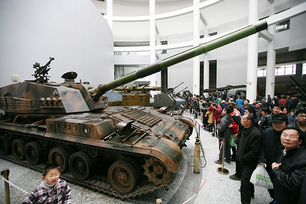 Visitors look at a Type-89 tank destroyer displayed at the Armament Museum at Nanjing University of Science and Technology in March last year. CHINA DAILY