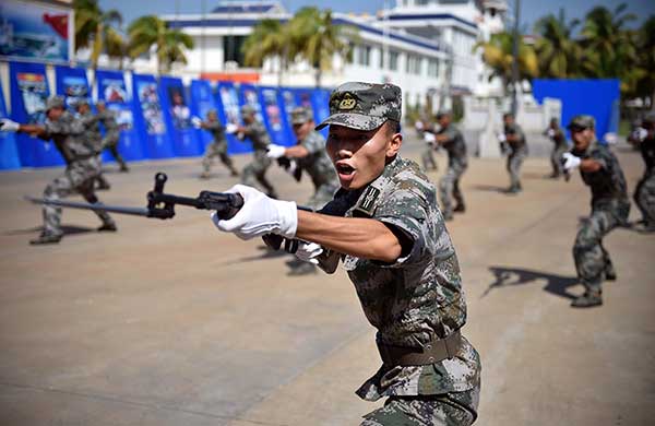 Maritime militia in Sansha, Hainan province, demonstrate their training in July. [Guo Cheng / Xinhua]