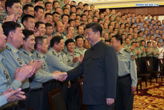 Chinese PresidentXi Jinpingshakes hands with senior military officers stationed in Heilongjiang, in Harbin, capital of northeast China's Heilongjiang Province, May 25, 2016. Xi Jinping, chairman of the Central Military Commission, inspected troops in Heilongjiang on Tuesday and Wednesday. (Photo: Xinhua/Li Gang)