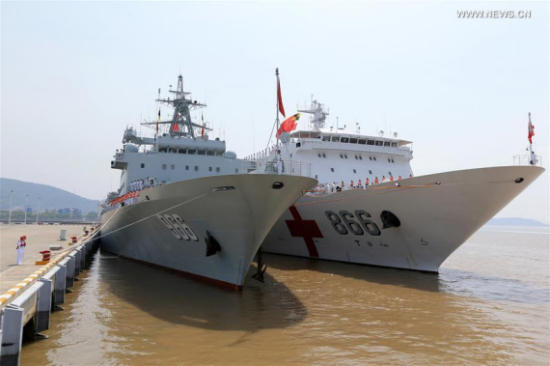 Chinese supply ship Gaoyou Lake (L) and hospital ship Peace Ark prepare to leave a military port in Zhoushan City, east China's Zhejiang Province, June 15, 2016, for Hawaii, the United States, to participate in the Rim of the Pacific - 2016 multinational exercises. Photo/Xinhua)