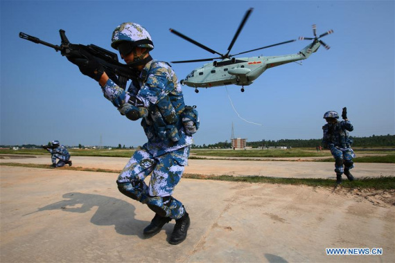 Marines take part in a joint naval drill in Zhanjiang, south China's Guangdong Province, Sept. 13, 2016. China and Russia started Joint Sea 2016 drill off Guangdong Province in the South China Sea on Tuesday. (Photo: Xinhua/Zha Chunming)
