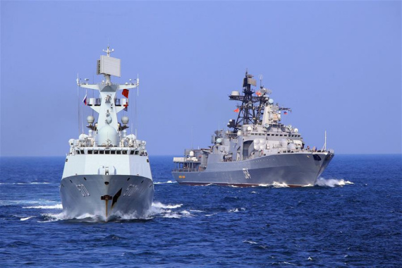 Chinese frigate Huangshan and Russian Navy's Antisubmarine Ship Admiral Tributs sail to a target area during a China-Russia naval joint drill at sea off south China's Guangdong Province, Sept. 16, 2016.  (Photo: Xinhua/Zha Chunming)