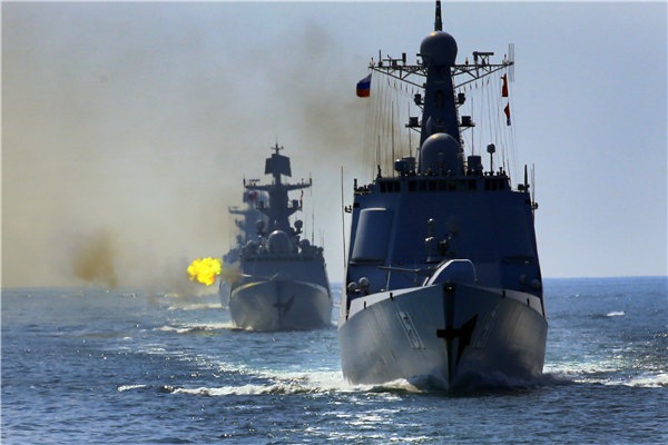 Chinese and Russian navies hold live artillery drill on Sunday.(Photo/Xinhua)