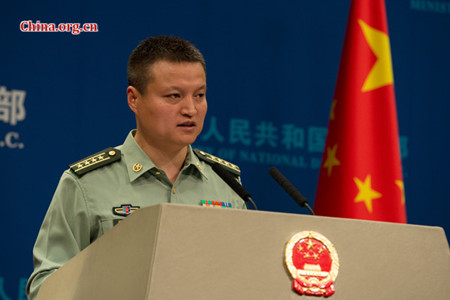 Senior Colonel Yang Yujun, spokesperson for China's Ministry of National Defense (MOD), takes questions at a routine press briefing on Thursday. (Photo/China.org.cn)