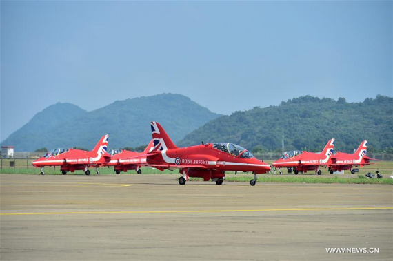 Jets of the Red Arrow, officially known as the Royal Air Force Aerobatic Team, arrive at the airport in Zhuhai, south China's Guangdong Province, Oct. 22, 2016. The British aerobatic team will perform at the 11th China International Aviation & Aerospace Exhibition, which will be held from Nov. 1 to 6 in Zhuhai. (Photo: Xinhua/Liang Xu)