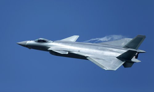 The J-20, China's new-generation stealth fighter, makes its debut with a flyby exhibition on the opening day of the China International Aviation and Aerospace Exhibition 2016, in Zhuhai, South China's Guangdong Province on Tuesday. (Photo: Cui Meng/GT)