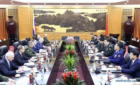 Chinese Defense Minister Chang Wanquan talks with Russian Defense Minister Sergei Shoigu in Beijing, capital of China, Nov. 23, 2016. (Photo: Xinhua/Zhang Ling)