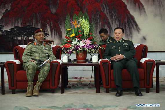 Fan Changlong (R), vice chairman of China's Central Military Commission, meets with Djibouti Armed Forces Chief of General Staff Zakaria Cheikh Ibrahim in Beijing, capital of China, Dec. 5, 2016. (Photo: Xinhua/Ju Zhenhua)