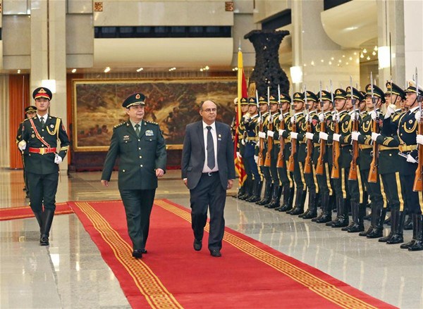 Chinese Defense Minister Chang Wanquan (2nd L, front) holds a welcoming ceremony for his Bolivian counterpart Reymi Ferreira before their talks in Beijing, capital of China, Dec. 27, 2016. (Xinhua/Liu Fang)
