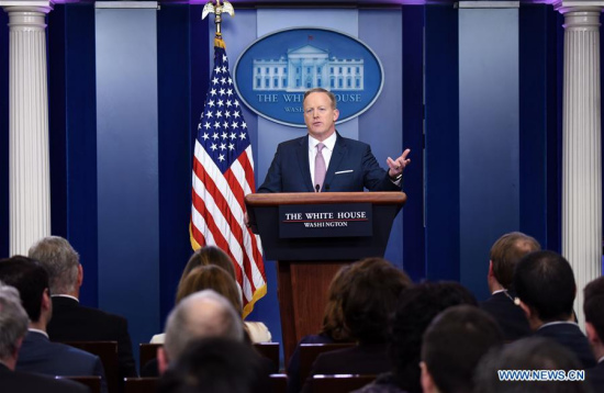 White House spokesman Sean Spicer speaks during his first official news briefing at the White House in Washington D.C., the United States, Jan. 23, 2017. (Xinhua/Yin Bogu)
