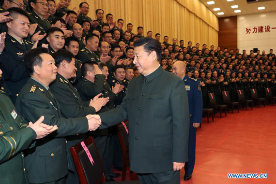 Chinese President Xi Jinping (R, front), also general secretary of the Communist Party of China (CPC) Central Committee and chairman of the Central Military Commission, shakes hands with senior military officers stationed in Zhangjiakou City, north China's Hebei Province, Jan. 23, 2017.   (Xinhua/Li Gang)