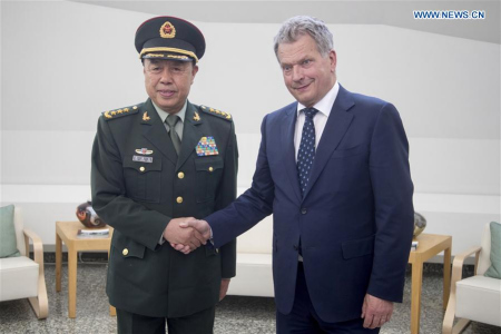Finnish President Sauli Niinisto (R) shakes hands with Fan Changlong, vice chairman of the Central Military Commission (CMC) of China, during their meeting in Helsinki, Finland, on June 16, 2017. (Xinhua/Matti Matikainen)