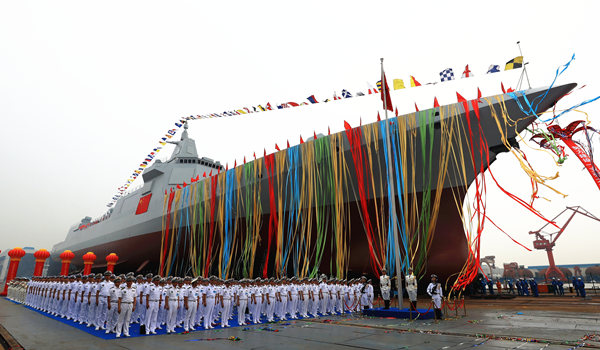 A launch ceremony for China's new-generation guided-missile destroyer is held in Shanghai on Wednesday.PU HAIYANG / FOR CHINA DAILY