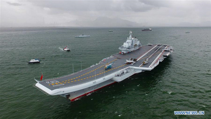 Chinese aircraft carrier Liaoning is berthed at the Victoria bay in Hong Kong Special Administrative Region (HKSAR), south China, July 7, 2017. A flotilla including China's first aircraft carrier Liaoning on Friday arrived in HKSAR for a visit, during which Liaoning will, for the first time, be open for the public to visit. According to the Navy's plan, sailors of the flotilla will attend local activities to celebrate the 20th anniversary of the People's Liberation Army being stationed in the HKSAR. (Xinhua/Zeng Tao)