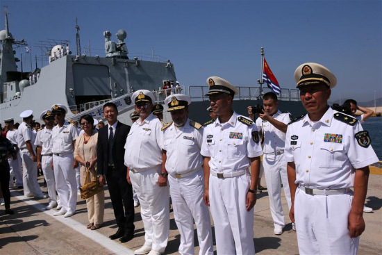 A welcome ceremony is held for the visiting Chinese naval fleet at Piraeus port, Greece, July 23, 2017. A Chinese naval fleet arrived on Sunday at Piraeus port for a four-day friendly visit to Greece, conveying a message of friendship and cooperation.(Xinhua/Marios Lolos)