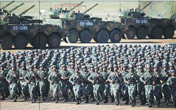 Soldiers quick-march during the parade marking the 90th birthday of the PLA at Zhurihe Training Base in the Inner Mongolia autonomous region on Sunday.(Feng Yongbin/China Daily)