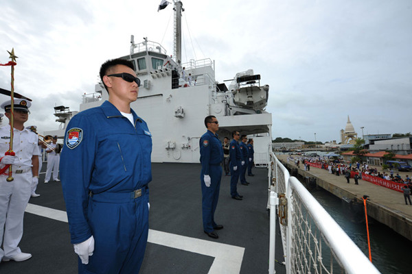 The crew of the hospital ship Peace Ark lines up on the board on Aug 6, 2017. Photo/Xinhua