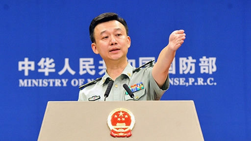 China's Defense Ministry spokesperson Wu Qian addresses a news briefing. (Photo/CGTN)