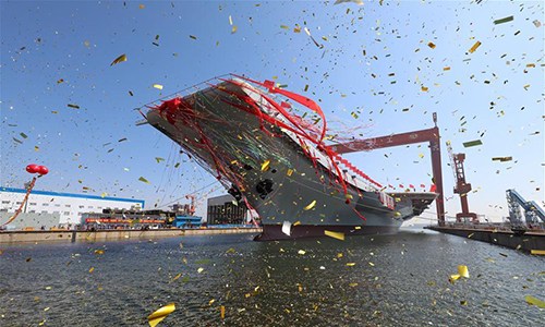 China's second aircraft carrier is transferred from dry dock into the water at a launch ceremony in Dalian shipyard of the China Shipbuilding Industry Corp. in Dalian, northeast China's Liaoning Province, April 26, 2017. The new carrier, the first domestically-built one, came after the Liaoning, a refitted former Soviet Union-made carrier that was put into commission in the Navy of the Chinese People's Liberation Army in 2012. (Xinhua/Li Gang)