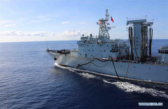 Chinese Navy's supply vessel Chaohu tries to replenish fuel for the destroyer Changchun (not in picture) in western Indian Ocean waters on Aug. 25, 2017. A Chinese naval formation consisting of the destroyer Changchun, guided-missile frigate Jingzhou and supply vessel Chaohu conducted a live-fire drill in the waters of the western Indian Ocean, military sources said Friday. (Xinhua/Xu Shouming)