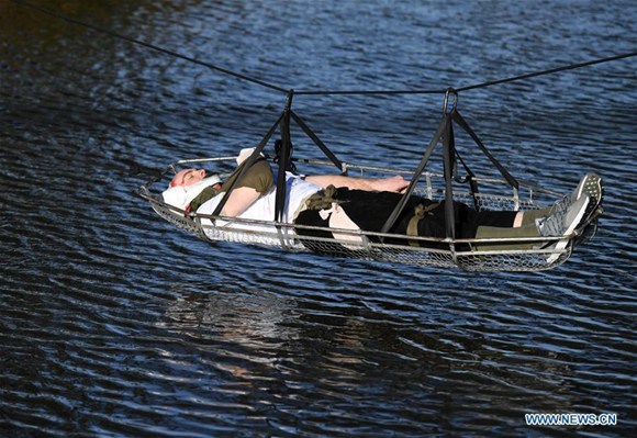 An American soldier participates in a drill at Camp Rilea in Seaside of Oregon, northwest United States, Nov. 18, 2017. The Chinese and U.S. militaries were holding the 5th joint drills on humanitarian relief and disaster rescue in Oregon. (Xinhua/Yin Bogu)