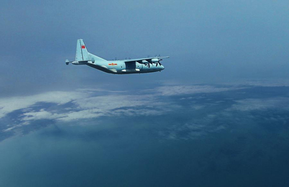 A Y-9 transport aircraft attached to the PLA Air Force flies above the South China Sea during the flight training starting from a military airfield in western China to a designated training area at an island near waters of the South China Sea in late November, 2017. (Photo/eng.chinamil.com.cn)