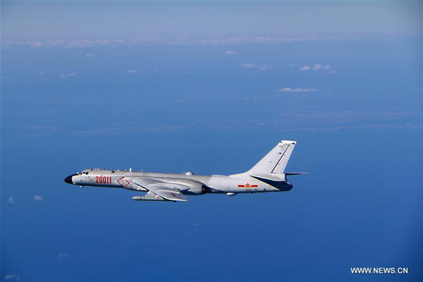 A Chinese air force plane flies for drills in international airspace over the Sea of Japan, Dec. 18, 2017. Chinese air force planes Monday flew through Tsushima Strait for the first time and conducted drills in international airspace over the Sea of Japan, an air force spokesperson said. (Xinhua/Wu Yuepeng)