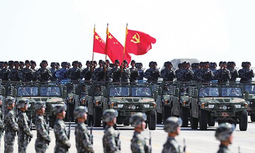 The military parades at Inner Mongolia's Zhurihe military training base on July 30. (Photo/Xinhua) 