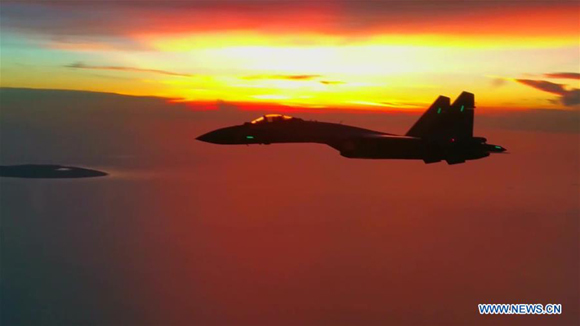 Photo of a video capture shows Su-35 fighter jets are on patrol. China has recently sent Su-35 fighter jets for a joint combat patrol mission in the South China Sea area, according to the People's Liberation Army (PLA) air force on Feb. 7, 2018. (Photo/Xinhua)