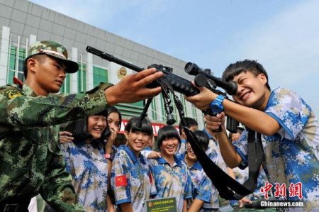 China to further deepen national defense education with opening military facilities