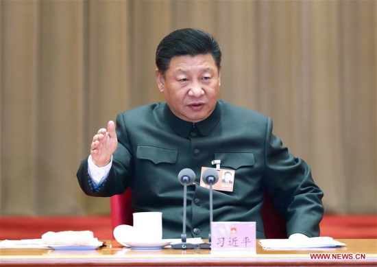 Chinese President Xi Jinping, also general secretary of the Communist Party of China (CPC) Central Committee and chairman of the Central Military Commission, speaks when attending a plenary meeting of the delegation of People's Liberation Army and armed police at the ongoing session of the 13th National People's Congress in Beijing, capital of China, March 12, 2018. (Xinhua/Li Gang)