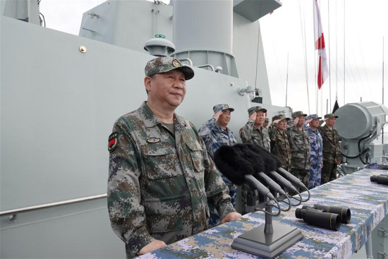 Chinese President Xi Jinping, also general secretary of the Communist Party of China Central Committee and chairman of the Central Military Commission, reviews the Chinese People's Liberation Army (PLA) Navy in the South China Sea on April 12, 2018. Xi made a speech after the review. (Xinhua/Li Gang)