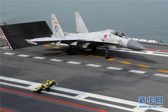 China's carrier fighter J-15, nicknamed Flying Shark, is the country's first generation multi-purpose carrier-borne fighter jet, with the capability to carry out various tasks. (Photo/Xinhua)