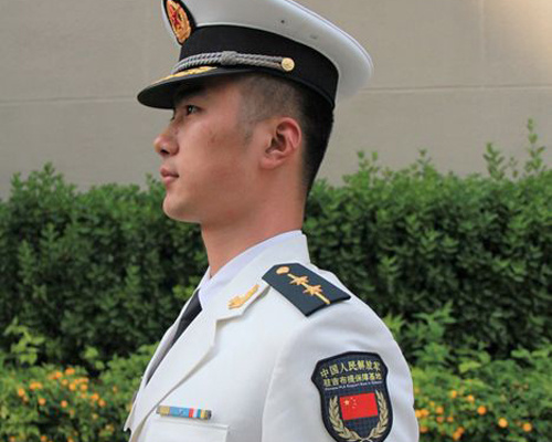 New badge, brassard designed for overseas troops