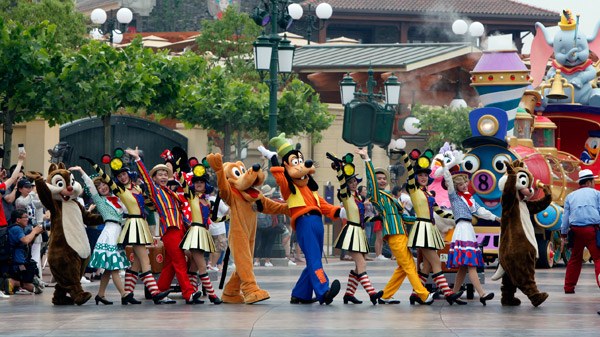 A cast of colorful characters takes part in a parade at the Shanghai Disney Resort on Wednesday, a day ahead of its grand opening. Gao Erqiang / China Daily